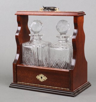 An Edwardian style brass mounted mahogany 2 bottle tantalus 30cm 