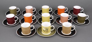 A set of 13 Susie Cooper for Wedgwood coffee cans and saucers, mixed colours 