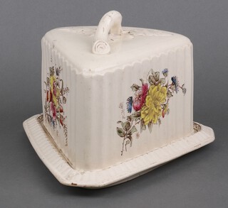 An Edwardian transfer print cheese dish and cover decorated with flowers 
