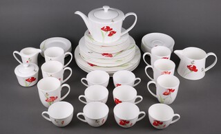 An Aynsley Meadow Pattern tea and coffee set comprising 8 tea cups, 6 mugs, milk jug, cream jug, sugar bowl and cover, teapot, 8 saucers, 6 small plates, 6 side plates, 6 medium plates and 4 dinner plates 