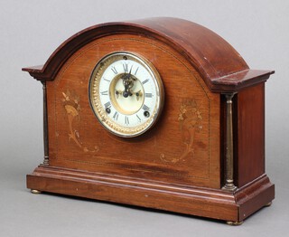 An Edwardian inlaid mahogany mantel clock with brass columns and bun feet 28cm