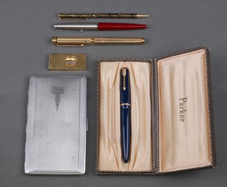 A chromium cigarette case, a collection of minor pens and pencils and a cigar cutter