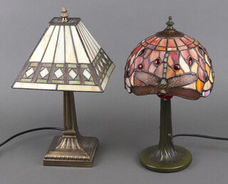 A verdigris "bronze" Liberty style table lamp with perspex shade 34cm h x 20cm, together with a similar square lamp with square shade 33cm 