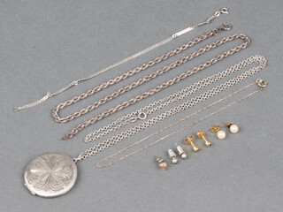 A silver engraved locket and chain and other items of silver jewellery etc 