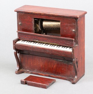 A musical box in the form of an upright piano 14cm (a/f)