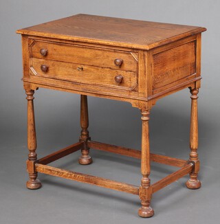 A 1930's Jacobean style oak cutlery chest of 2 drawers, raised on turned supports with bun feet 79cm x 74cm x 50cm  