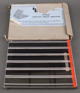 A Harvey-Brenson contact sheet printer, boxed 