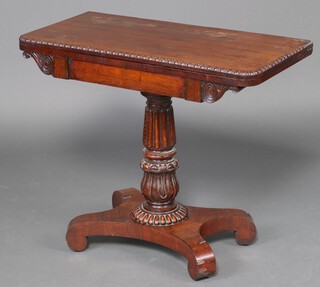 A William IV rosewood D shaped card table, raised on a turned column and triform base 77cm h x 92cm w x 45cm d (water and contact marks in places, sections of moulding missing to edge) 