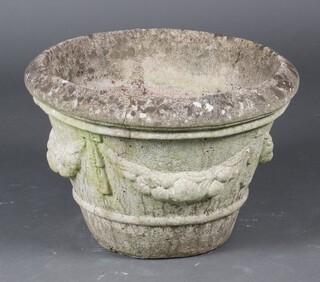 A circular garden planter with swag decoration 33cm x 48cm 