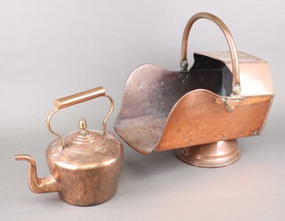 A Victorian copper helmet shaped coal scuttle with 4 holes to the top and a copper kettle with acorn finial 14cm 