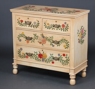 A cream and floral painted pine chest of 2 short and 2 long drawers with brass plate drop handles, raised on bun feet 29cm h x 94cm w x 43cm  