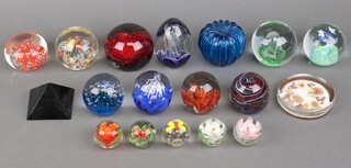 A collection of mid-Century Studio Glass paperweights 