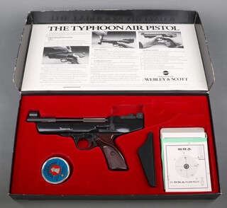 A Webley Typhoon air pistol with targets and pellets, boxed