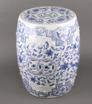 A modern Chinese ceramic garden barrel seat decorated with scrolling flowers 40cm 