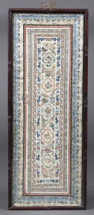 A Chinese silk work embroidery of flowers and insects, framed 66cm x 25cm 
