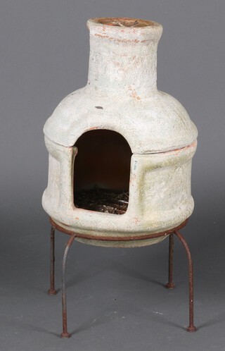 A terracotta garden Chiminea 55cm h x 37cm diam. 