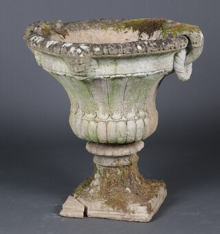 A twin handled garden urn with reeded decoration 72cm h x 59cm diam. (chip to base) 