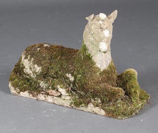 A well weathered concrete garden figure of a unicorn 41cm x 55cm x 20cm (horn a/f) 