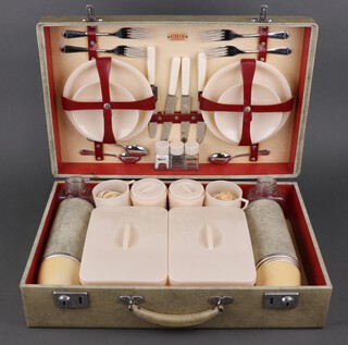 A Sirram picnic hamper set and contents, contained in a white fibre case 