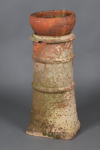 A circular terracotta planter 17cm x 31cm and a ditto chimney pot 73cm x 30cm 