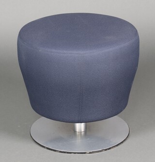 An Orangebox mid-Century stool upholstered in blue material, on a circular chrome base 47cm h x 52cm diam. 