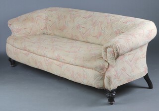 A Chesterfield style sofa upholstered in tapestry style material raised on ebonised supports 69cm h x 210cm w x 70cm d (seat 140cm x 46cm) 