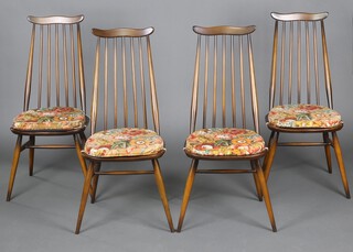 Ercol, a mid-Century set of 4 dark beech and elm stick back chairs, raised on turned supports with H framed stretchers 95cm h x 42cm w x 40cm d 