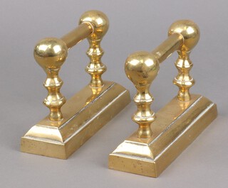 A pair of Victorian brass railed fire dogs 15cm h x 20cm w x 6cm d 