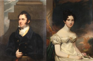 Circle of Sir Thomas Lawrence (English 1769-1830) - three quarter length Portrait of a Lady wearing a silk and organza empire dress and holding a rose and a three quarter length Portrait of a Gentleman wearing a black jacket, yellow waistcoat and white stock, in front of a stone column, a pair of early 19th Century oils on canvas, Christie's stencils verso, each 90cm x 69cm, both within gilt composition frames with egg and dart ornament
