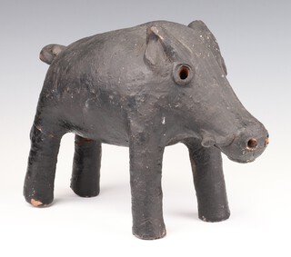 A 20th Century black glazed Earthenware figure of a standing wild boar 21cm 