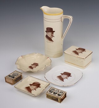 A Newhall Pottery commemorative jug with a portrait of Winston Churchill 20cm (restored), a ditto cigarette box 9cm (chipped lid and stuck base), ditto mug (chipped), an ashtray (rubbed gilding) 9cm, together with a J & G Meakin scalloped dish 15cm, a plate 13cm and 2 associated metal match box sleeves, all bearing portraits of Churchill 
