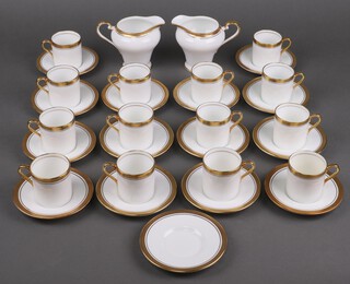 An Aynsley Elizabeth 7947 part coffee and dinner service comprising 14 coffee cans (3 a/f), 15 saucers (1/4), 2 milk jugs (both a/f), with gilt leaf decoration 