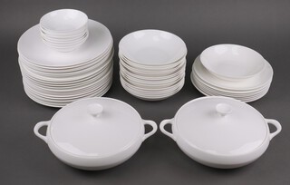 A Royal Worcester Snow pattern part dinner service comprising 8 side plates (2 a/f), 2 tureens and covers (1 tureen a/f, 1 cover a second), 20 dinner plates (1 a second and 8 unmarked), 8 dessert bowls (1 a/f, 2 seconds), 16 soup bowls (9 unmarked) 
