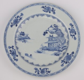 An 18th Century Chinese blue and white plate decorated with pagodas enclosed by flowers 22cm, on reverse a certificate for the Nankin to Knightsbridge Christies Auction 