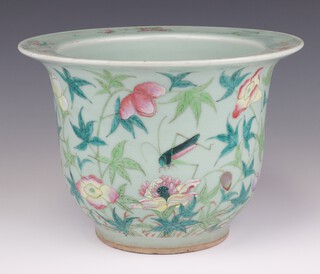 A 20th Century Chinese Celadon jardiniere with flared rim decorated with grasshoppers amongst flowers 29cm 