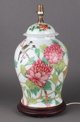A 20th Century Chinese baluster vase and cover decorated with birds amongst flowers on a wooden stand, converted to a table lamp 44cm 
