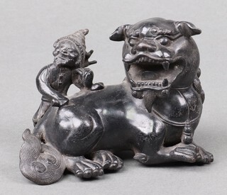 A 19th Century Chinese bronze figure of a seated Shi Shi with figure 8cm x 11cm x 6cm 