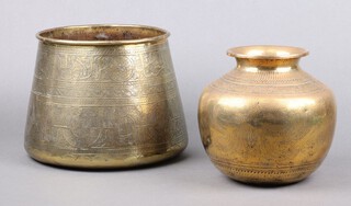 A 19th Century Benares brass spittoon 18cm x 17cm together with a jardiniere of waisted form 18cm x 20cm