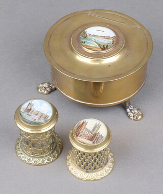 A Victorian circular brass trinket box with hinged lid decorated a printed panel of Niagara Falls and A Present From The Falls, on hoof feet 5cm x 12cm together with 2 pierced jars and covers, 1 decorated The Palace of Westminster 6cm x 4cm (a/f), the other Canterbury 5cm x 4cm 
