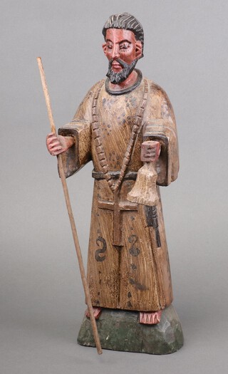 A carved wooden figure of Peter of Saint Joseph de Betancur 43cm  