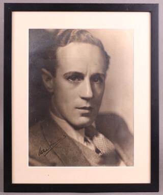 Leslie Howard, a signed black and white studio photograph of Leslie Howard,  33cm x 25cm 