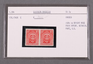 Southern Rhodesia 1924 1d stamp, bright rose pair, imperf between.  Part O.G.  Unused. SG 2a.  1.304. 178.17426 C, as purchased from Stanley Gibbons in 1978