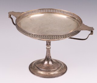 A circular silver tazza with pierced rim on a splayed foot with engraved inscription, Sheffield 1918, maker Martin Hall and Company Ltd., 13cm, 294 grams 