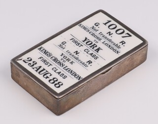 A Victorian silver and enamelled rectangular vesta, in the form of a railway ticket 1007 G.N.R. Not transferrable Kings Cross London to York, 1st Class, 23 Aug. 88, Birmingham 1888, maker Horton and Allday, 6cm x 4cm, 48 grams 