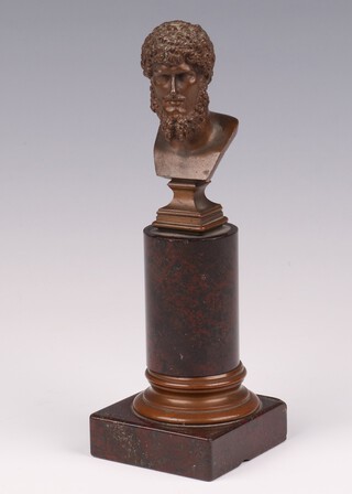 Ferdinand Barbedienne (French, 1810-1892), a bronze portrait bust of Lucius Verus, signed on reverse F Barbedienne, the bust 7.5cm, raised on a gilt metal mounted red marble plinth, total height 16cm 