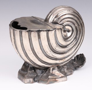 A Victorian silver plated spoon warmer in the shape of a shell on a rocky base 17cm 