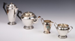 An Art Deco style 4 piece silver plated tea and coffee set comprising teapot, coffee pot, sugar bowl and cream jug with Cymric decoration 