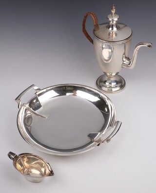 A 19th Century silver plated coffee pot with wicker handle 30cm, an Art Deco plated tray and jug by the Goldsmiths and Silversmiths Company 