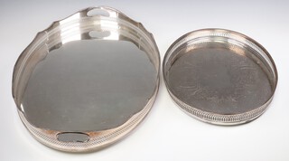 An oval silver plated galleried tray 60cm and a smaller ditto 42cm 