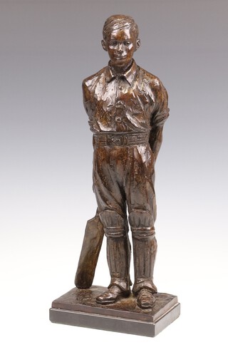 **James Butler RA (British 1931-2022), a bronze figure of a standing cricketer holding a bat in his right hand, looking left, raised on a marble base, the bronze signed and stamped with monogram 41cm ** Please Note - Artists Re-Sale Rights may be payable on this lot 